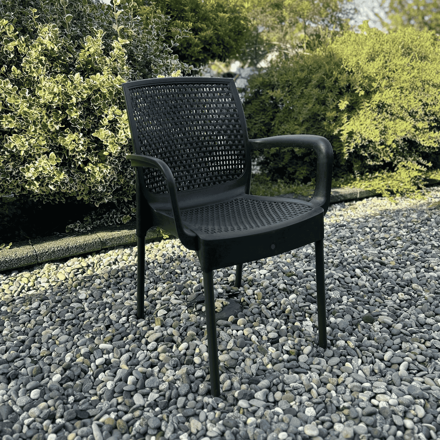 Defne Rattan-Style Black Armchair with Brown Iron Legs - Eco-Friendly, Recycled Plastic for Indoor & Outdoor Use